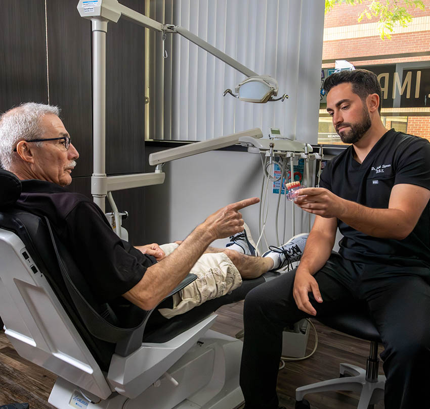 Get Your Bite Back With Full-Arch Dental Implants in New Hudson